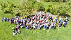 Co-workers of both institutes meet at the "Amphitheater" between the two institute buildings (drone shot).